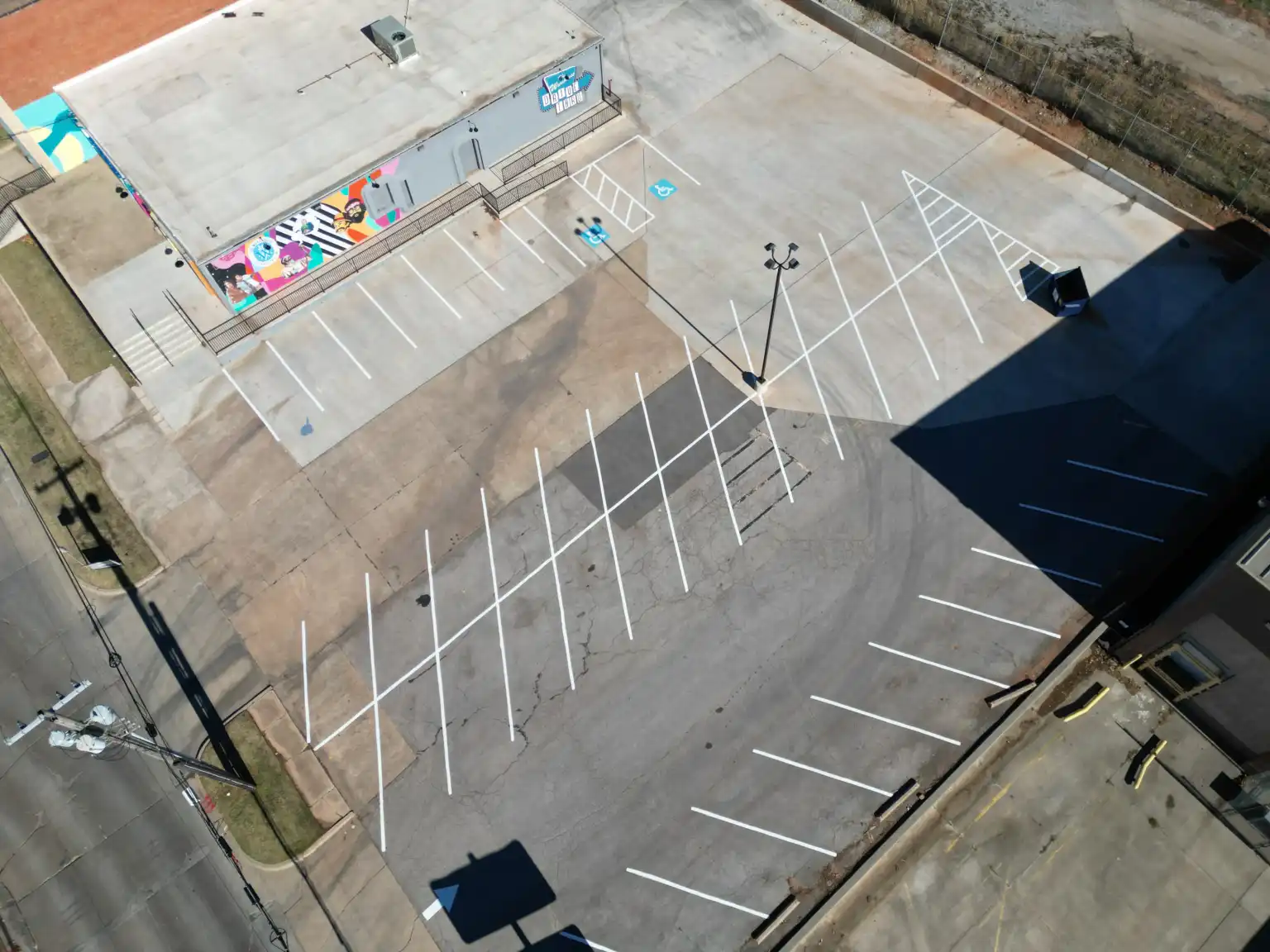 New parking blocks installed on a brick surface.